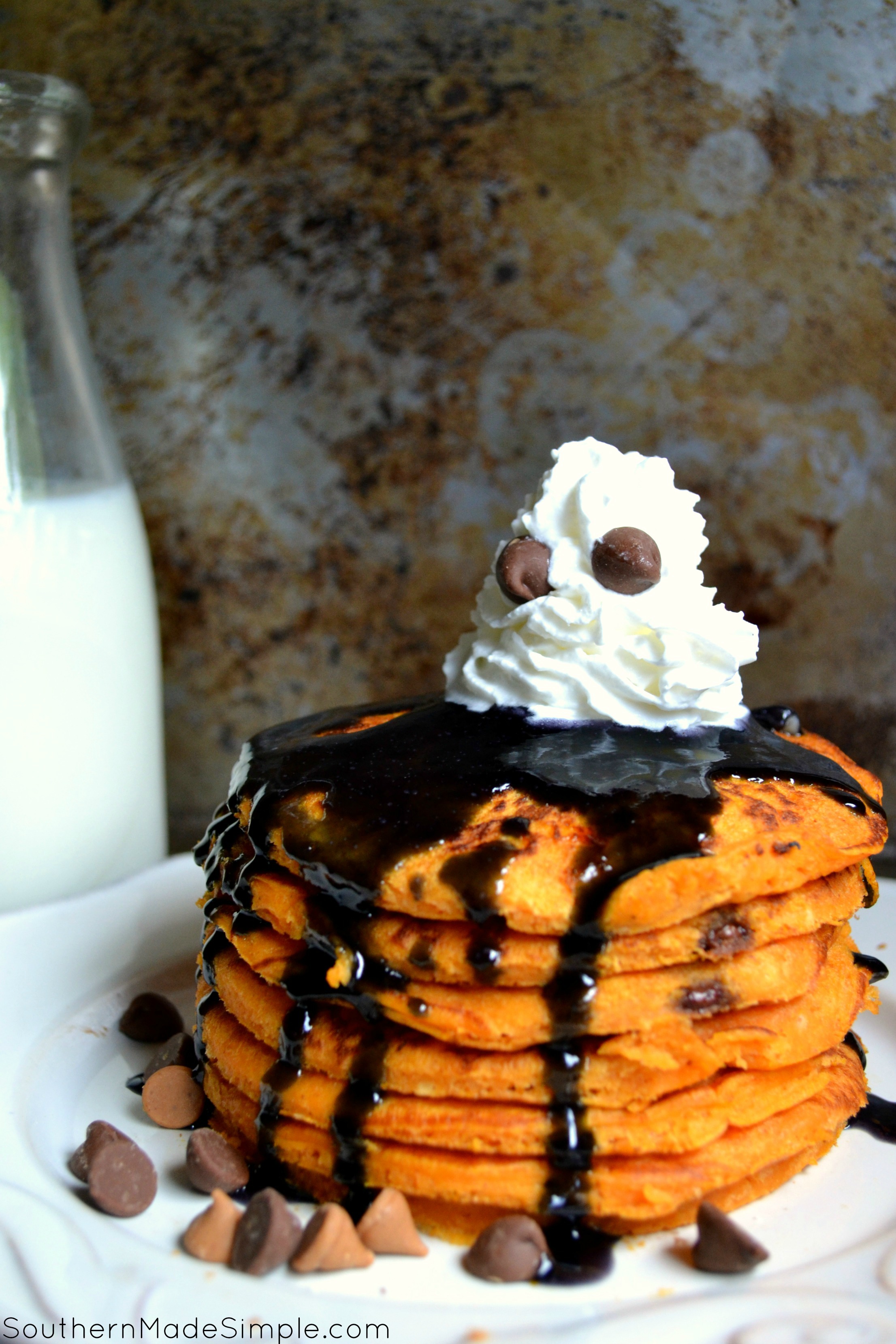 Haunted Halloween Pancakes | These SUPER simple pumpkin pancakes make for a perfect Halloween morning treat!