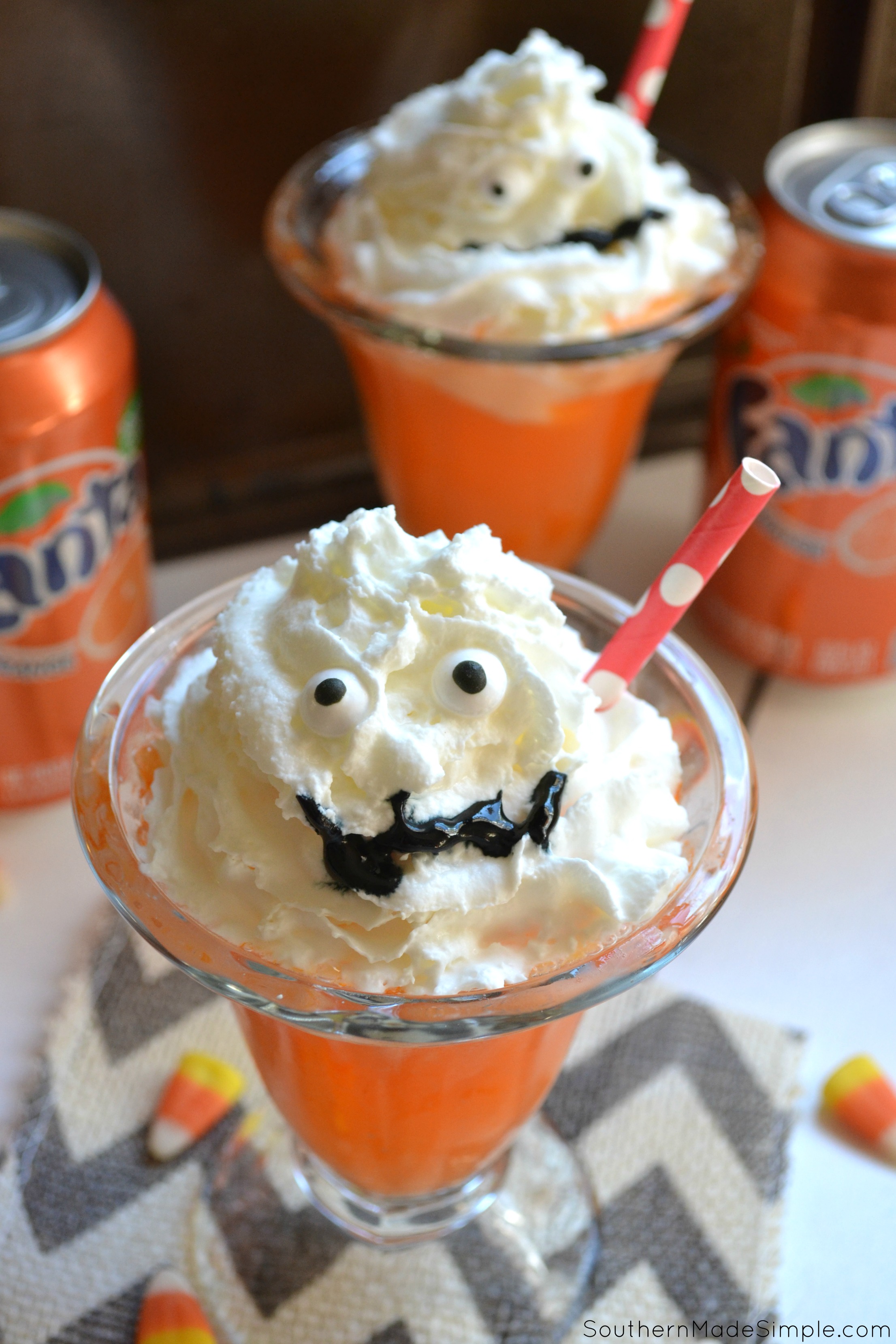 These cute little Orange Fanta Scram-scicle floats are the perfect treat to serve for a hauntingly awesome Halloween! They're simple to make and even more fun to devour...if you dare! #WickedFantaFun #ad