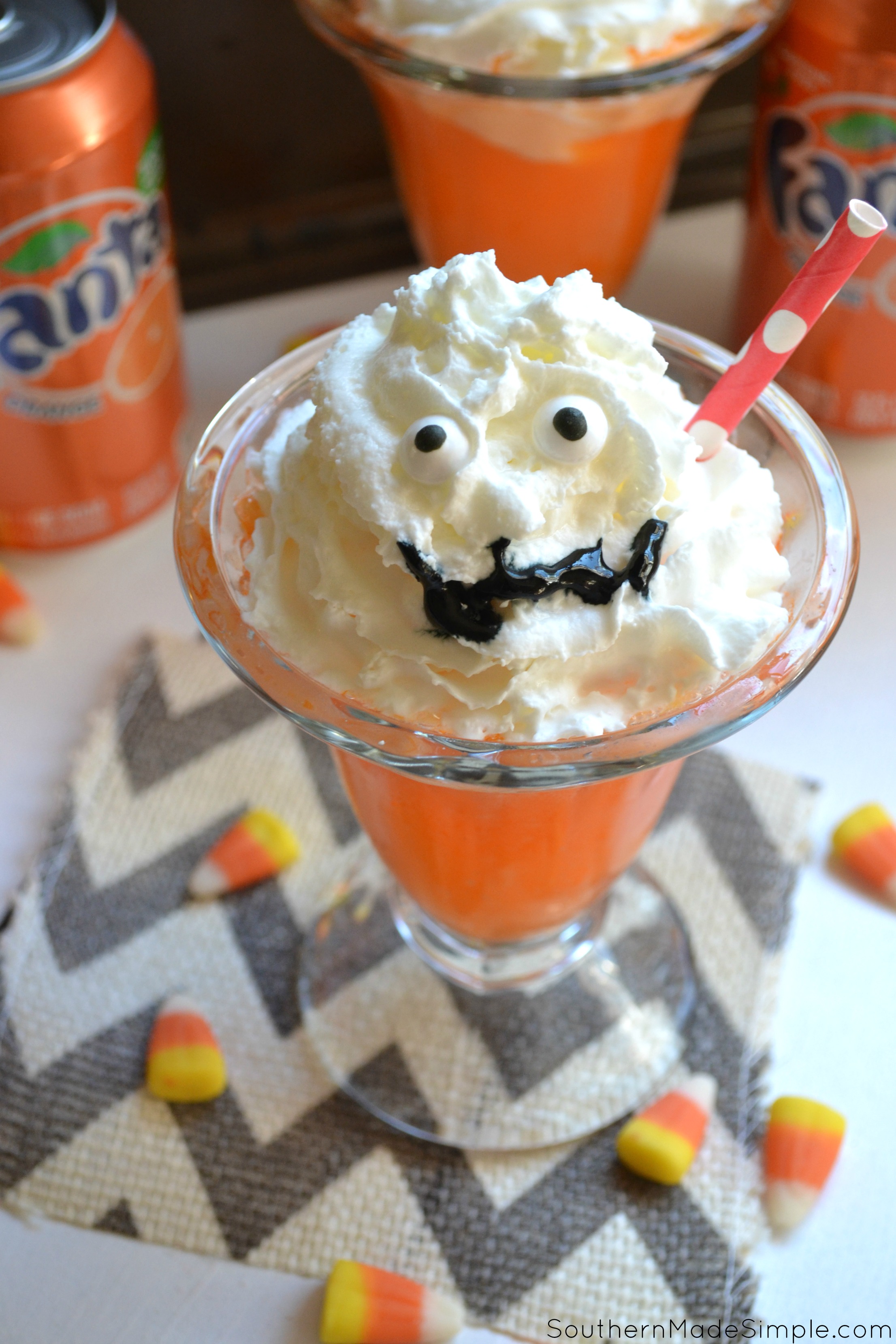 These cute little Orange Fanta Scram-scicle floats are the perfect treat to serve for a hauntingly awesome Halloween! They're simple to make and even more fun to devour...if you dare! #WickedFantaFun #ad