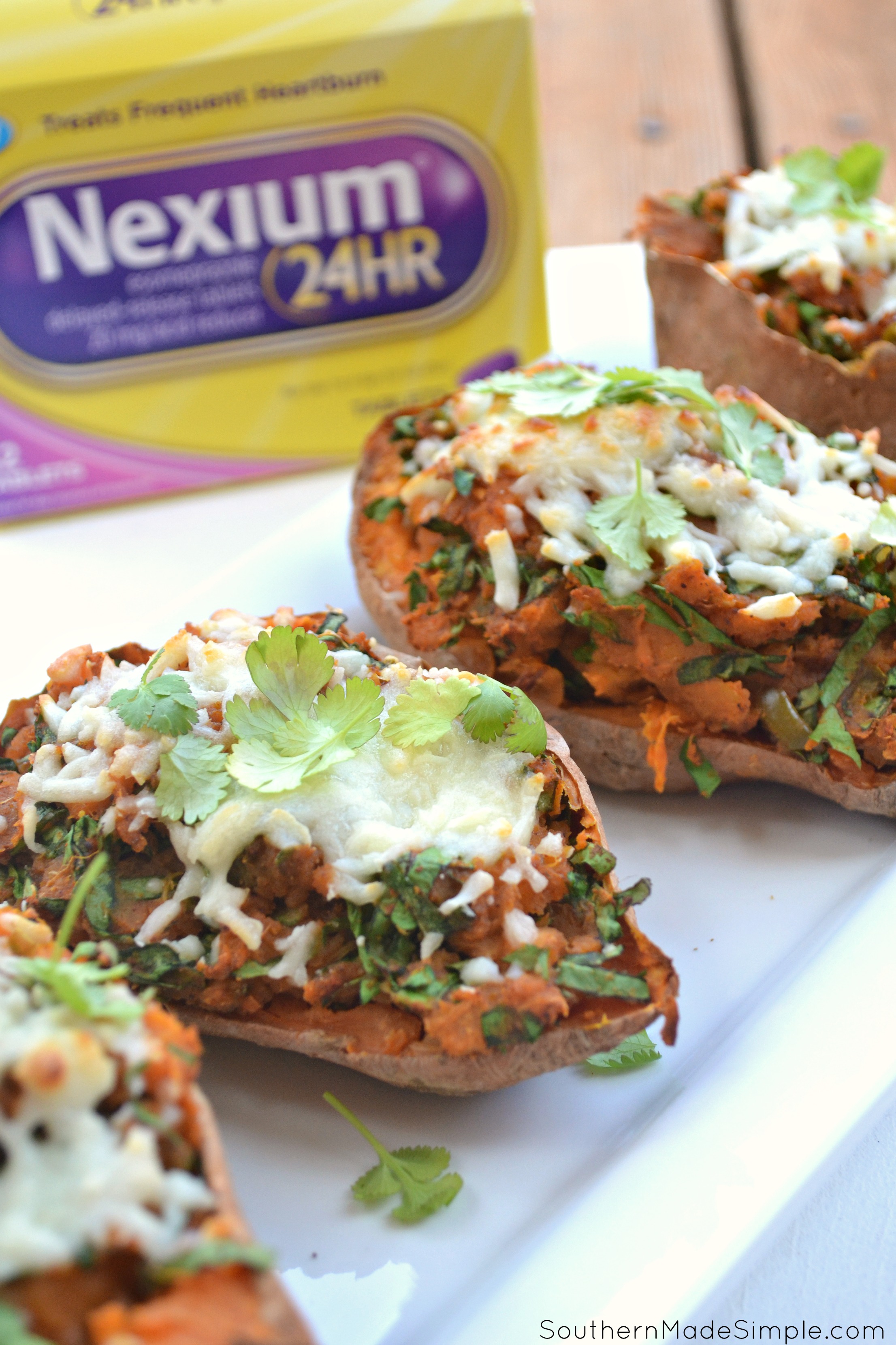 Looking for a delicious and unique way to spice up your Thanksgiving menu? These Spicy Twice Baked Sweet Potatoes are just the thing you've been looking for! #MakeHeartburnHistory #ad