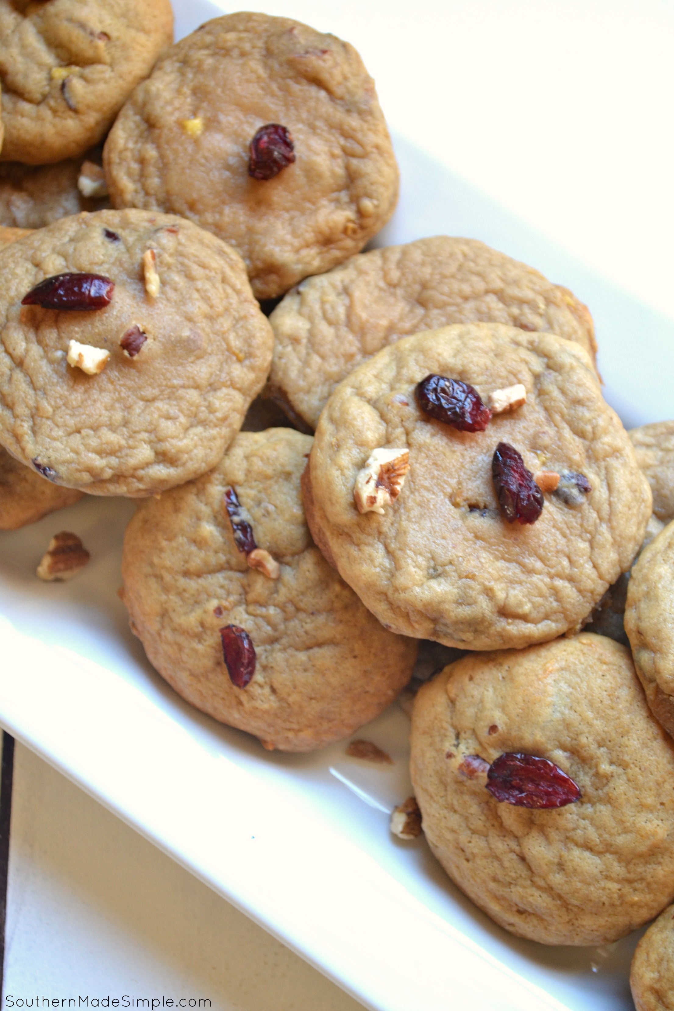 These Banana Nut Cranberry Cookies taste just like a delicious banana nut muffin, but in cookie form! They're perfectly moist, soft and chewy!