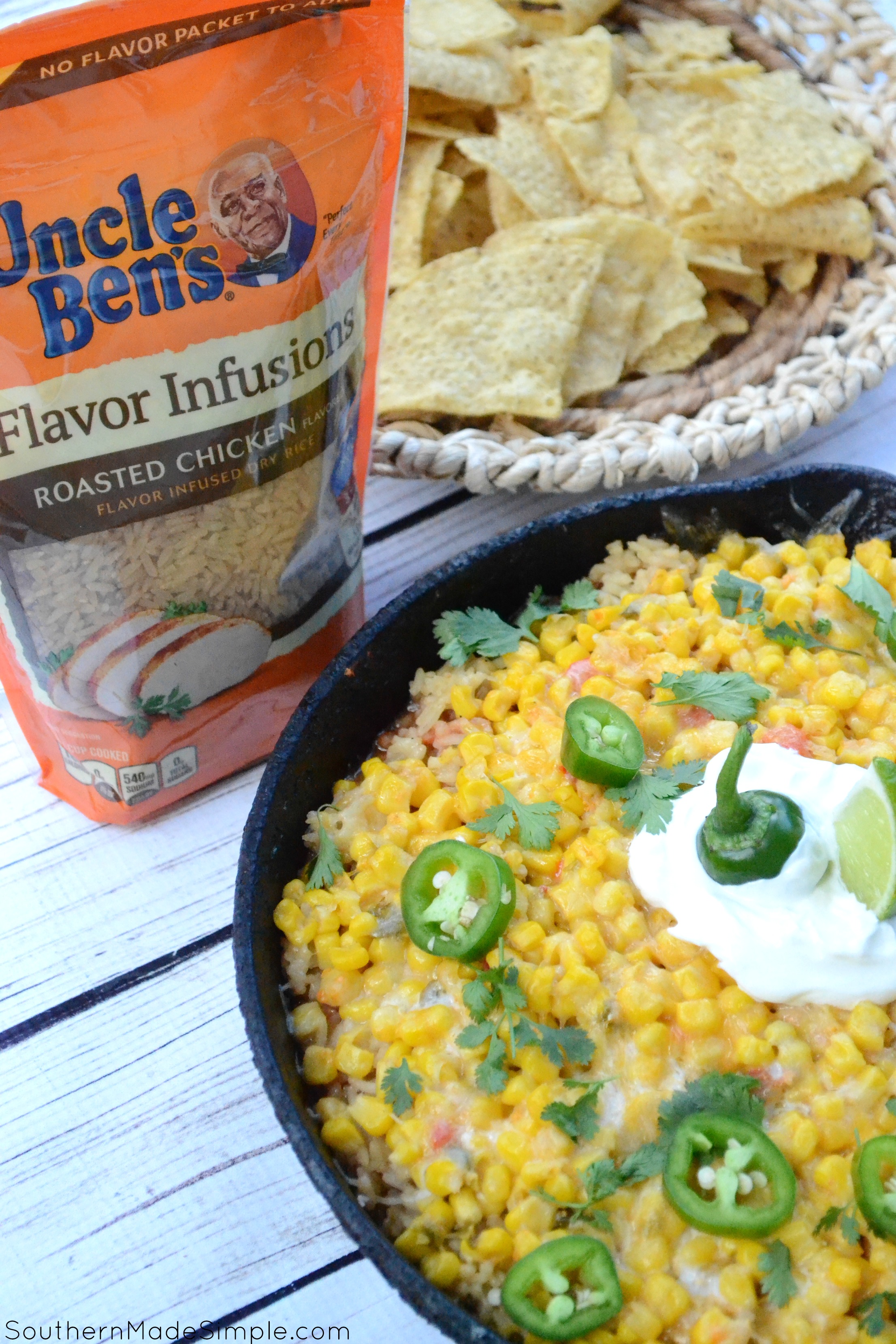 Looking for a quick and easy weeknight meal to take your "Taco Tuesday" to a whole new level? This Cheesy Chicken & Rice Burrito Dip is ready in 30 minutes, only requires one pan and will become a family favorite after the very first bite! #UncleBens #FlavorInfusions #ad