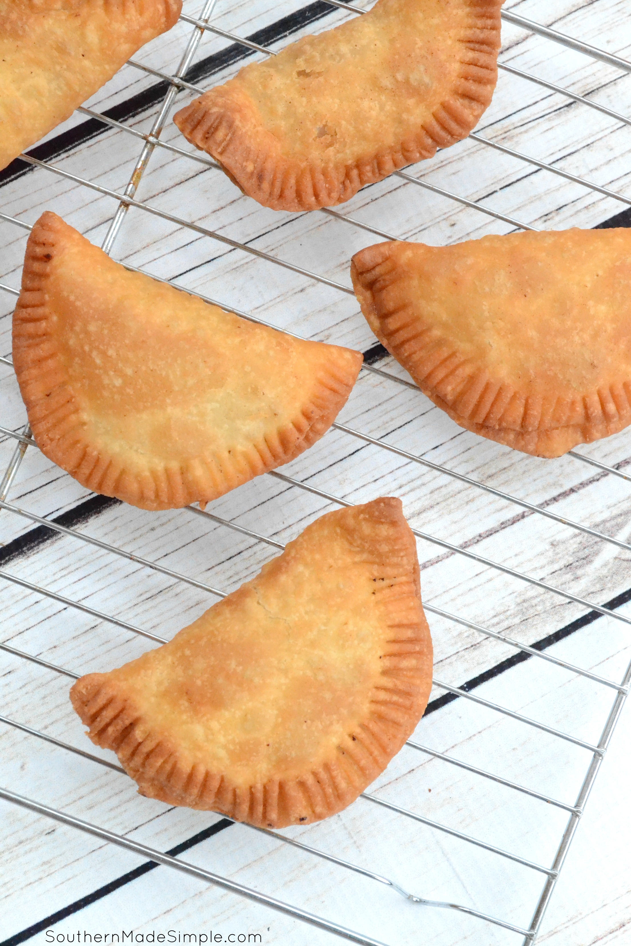 There's nothing better than taking a big of a flaky warm fried peach pie on those hot summer days, and this recipe for Southern Fried Peach Hand Pies is sure to be just the thing you need to make your summer extra sweet! #CreateWithOil #ad 