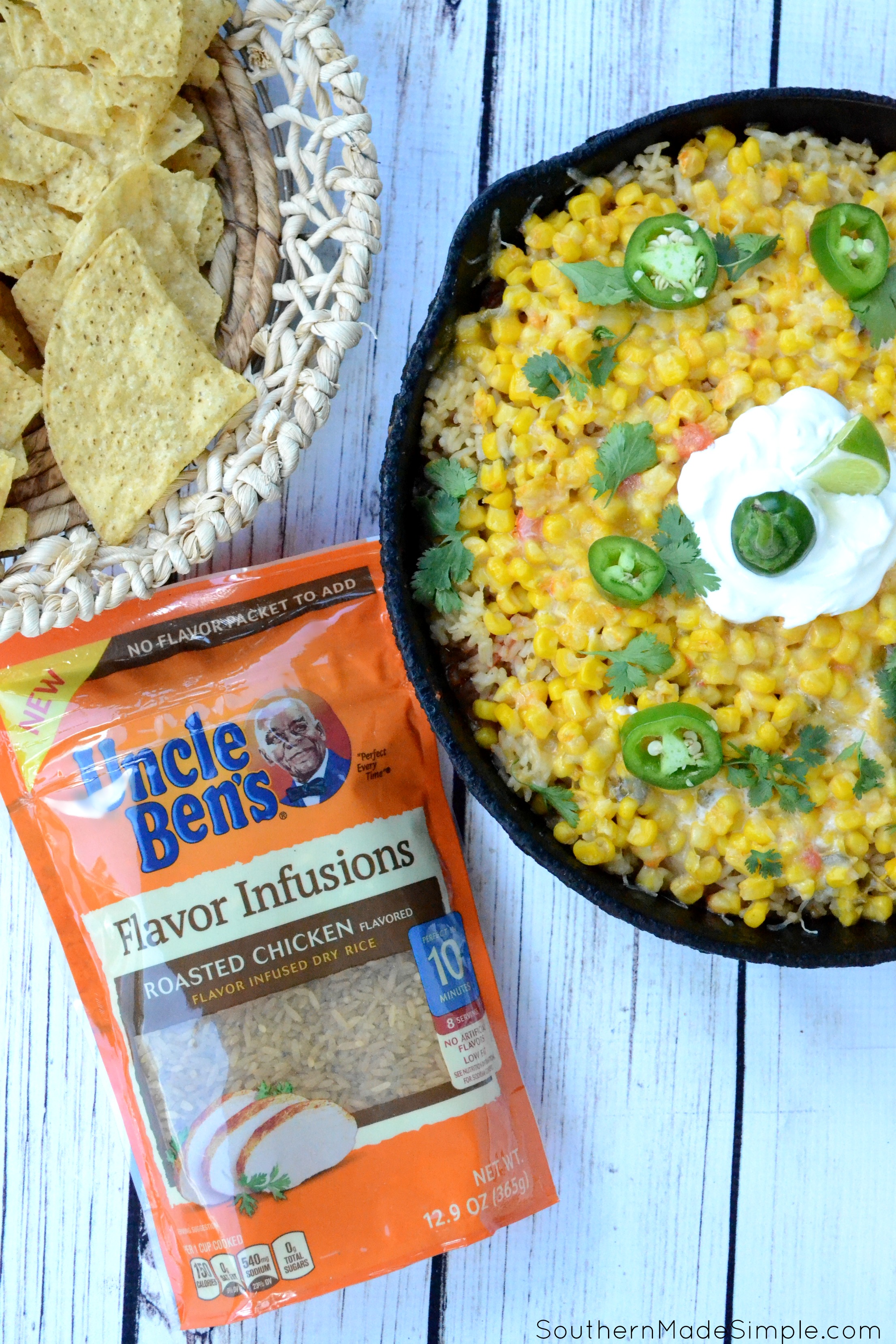 Looking for a quick and easy weeknight meal to take your "Taco Tuesday" to a whole new level? This Cheesy Chicken & Rice Burrito Dip is ready in 30 minutes, only requires one pan and will become a family favorite after the very first bite! #UncleBens #FlavorInfusions #ad