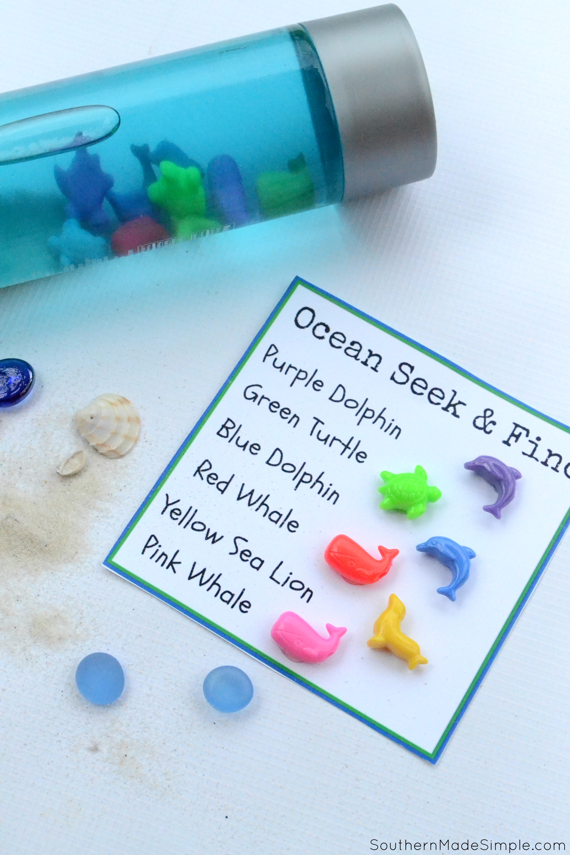 Do you have a toddler in the back seat who hates riding in the car? Take along this easy DIY Ocean Seek and Find Bottle to help keep them entertained!#RoadTripOil #ad