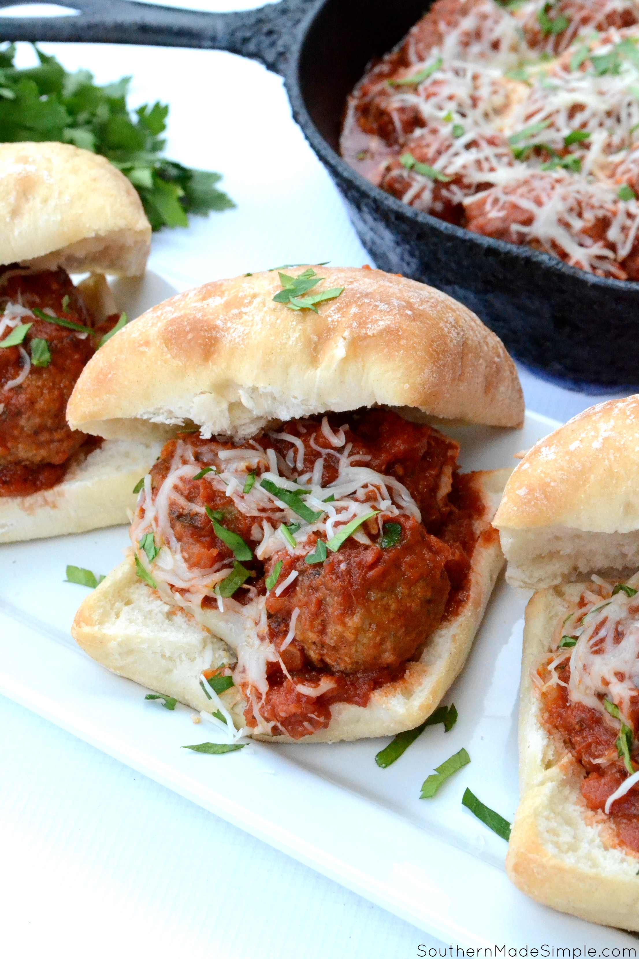 Do your weeknights leave you little room to prepare a cooked meal for your family? These Easy Meatball Parmesan Sliders are easy to make and take little time, plus they're absolutely delicious! #ad