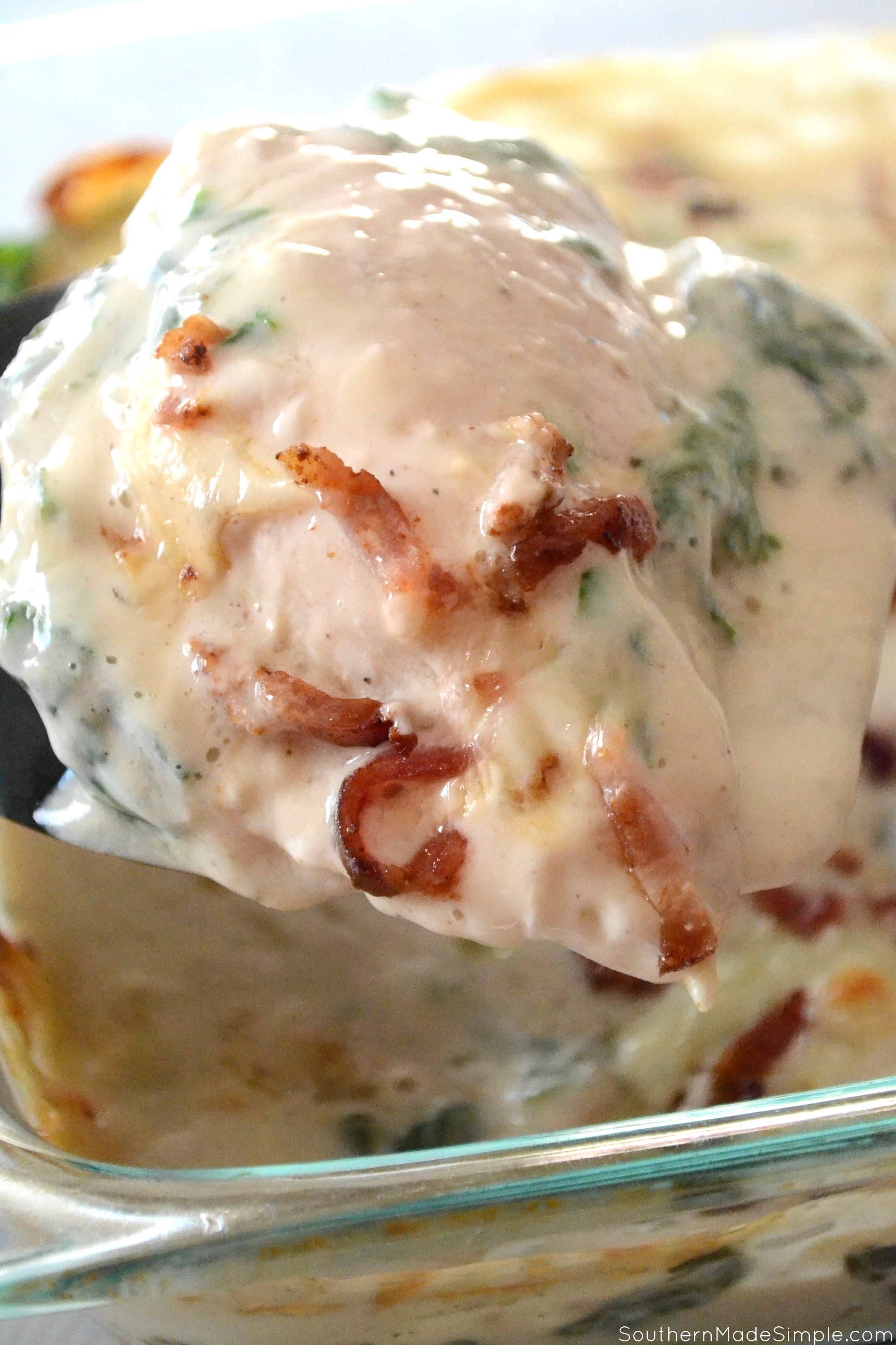 There's nothing better than a baked potato loaded with delicious cheesy goodness, and these Cheesy Chicken & Spinach Alfredo Baked Potatoes are overflowing with the the creamiest alfredo sauce made by Ragu that will make you go back for seconds!