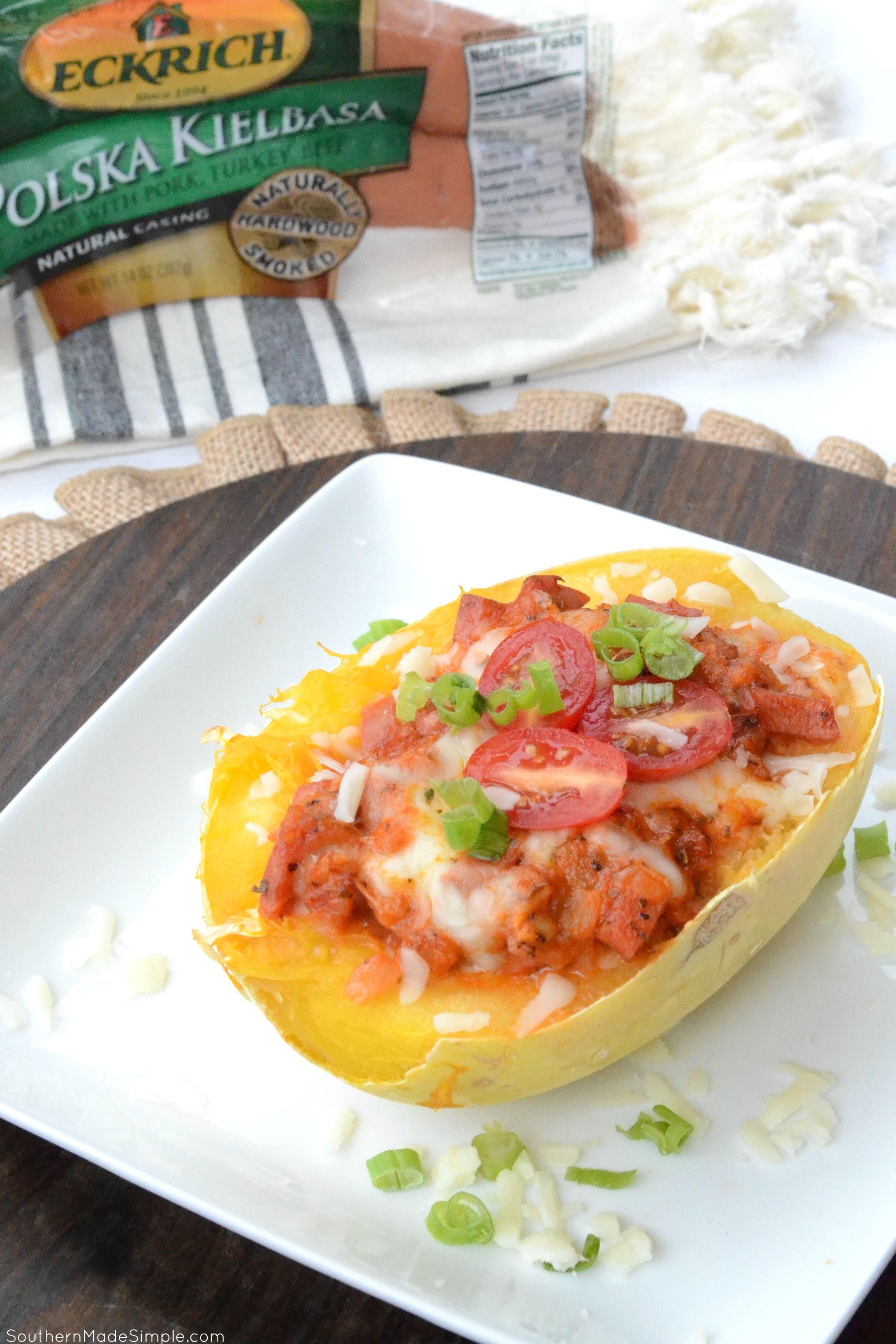 Ready to revamp your family weeknight meals? This Cheesy Smoked Sausage Stuffed Spaghetti Squash is a fun twist on classic spaghetti with a simple & healthier twist! #EverydayEckrich #ad