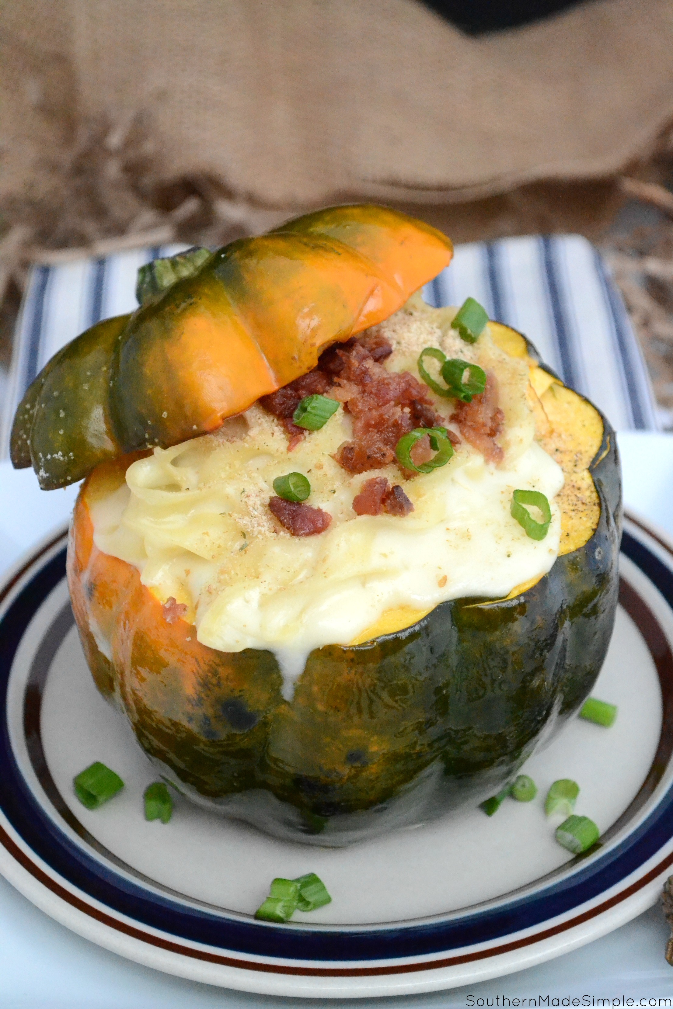 The fall season is in full swing, which means it's time to fall in love with this recipe for Pepper Jack Macaroni and Cheese Stuffed Acorn Squash! The nutty flavor of the squash paired with the creamy cheese sauce and perfectly cooked noodles makes this dish a mouthwatering treat! #ad #NoYolks #NoOtherNoodle #MC