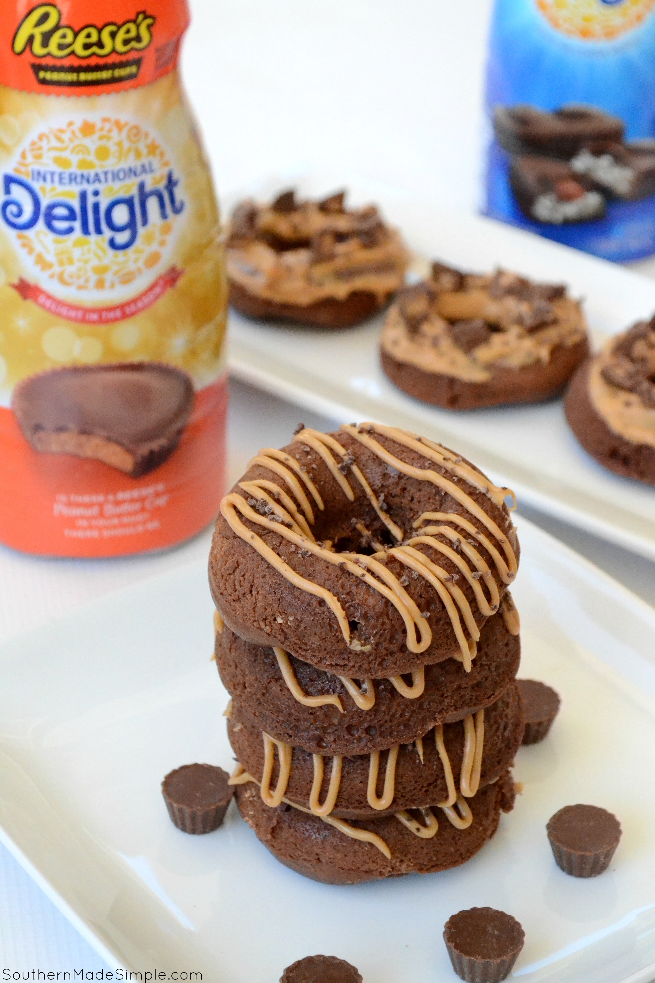 These Glazed Chocolate Peanut Butter Cup Doughnuts are a decadent treat that are easy to make, and they're perfect paired with your morning cup of coffee! #ad #DelightfulMoments #SplashOfDelight