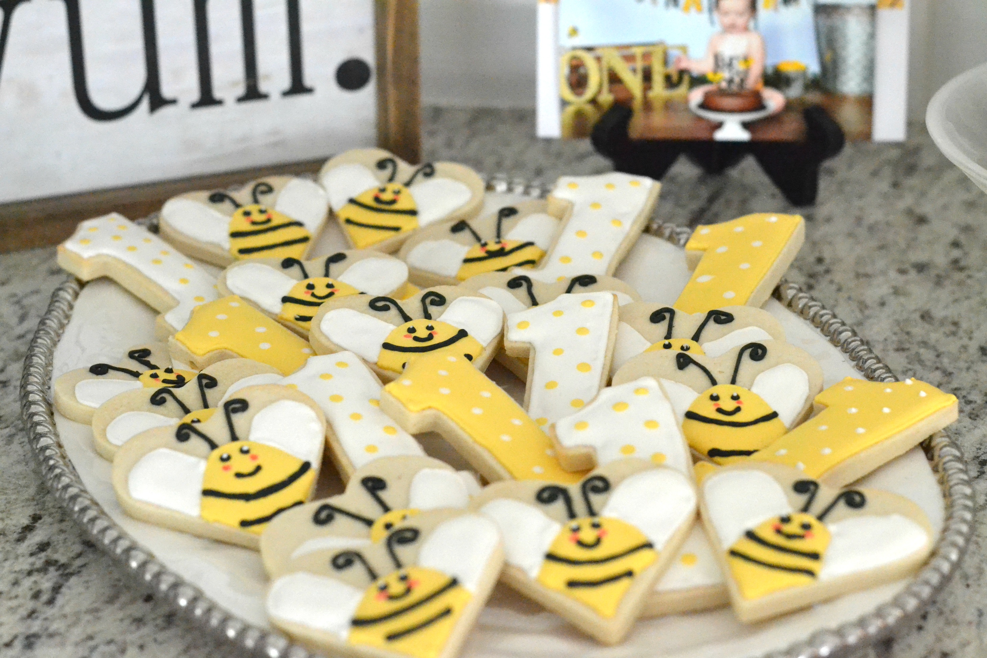 Laken's 1st Bee-Day: Bumble Bee Themed Birthday Party Ideas #beeday #beeparty #beesmashcake